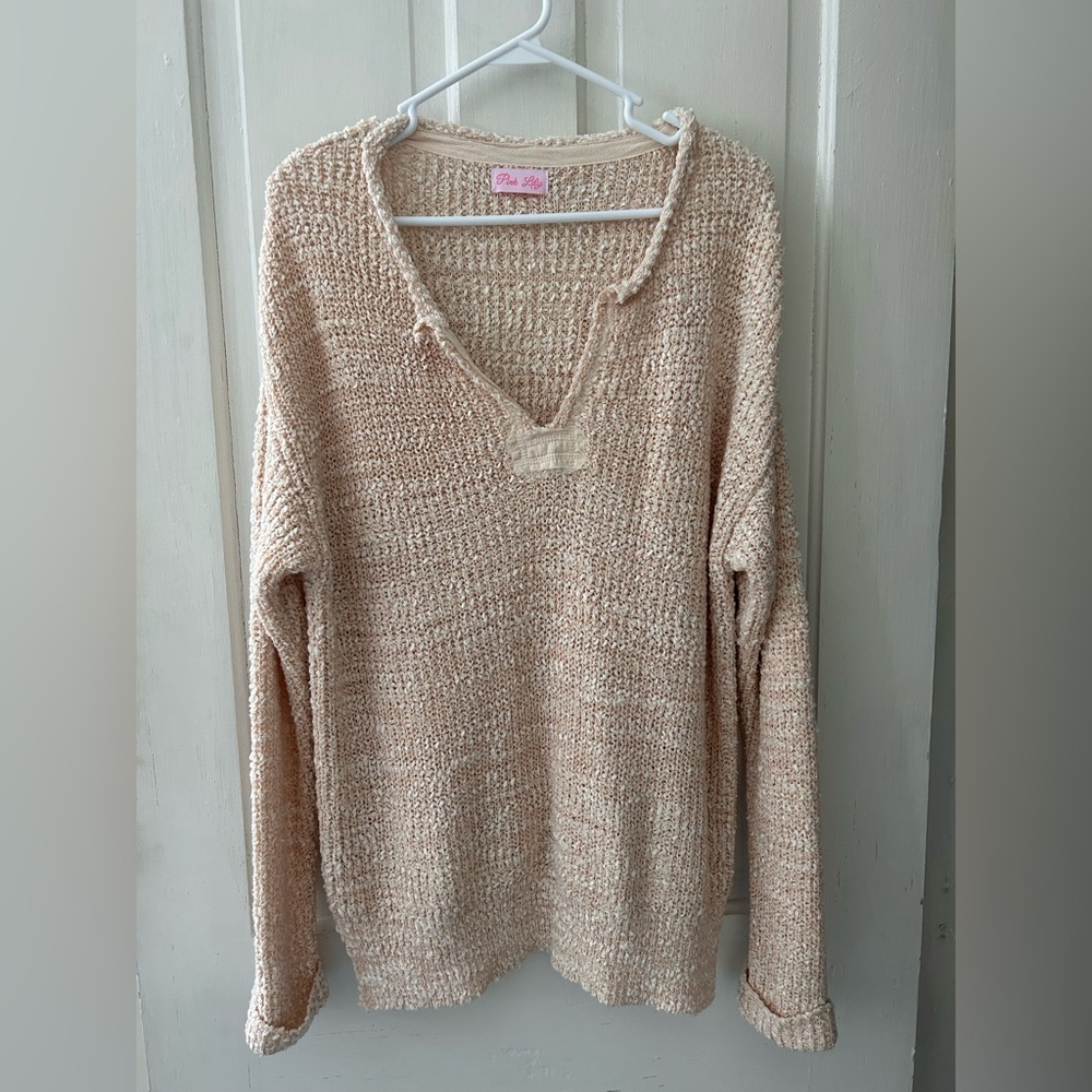 Pink Lilly sweater.